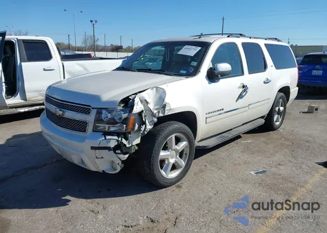 2011 Chevrolet Suburban 1500 Ltz z USA, uszkodzony, nr VIN 1GNSCKE09BR103105